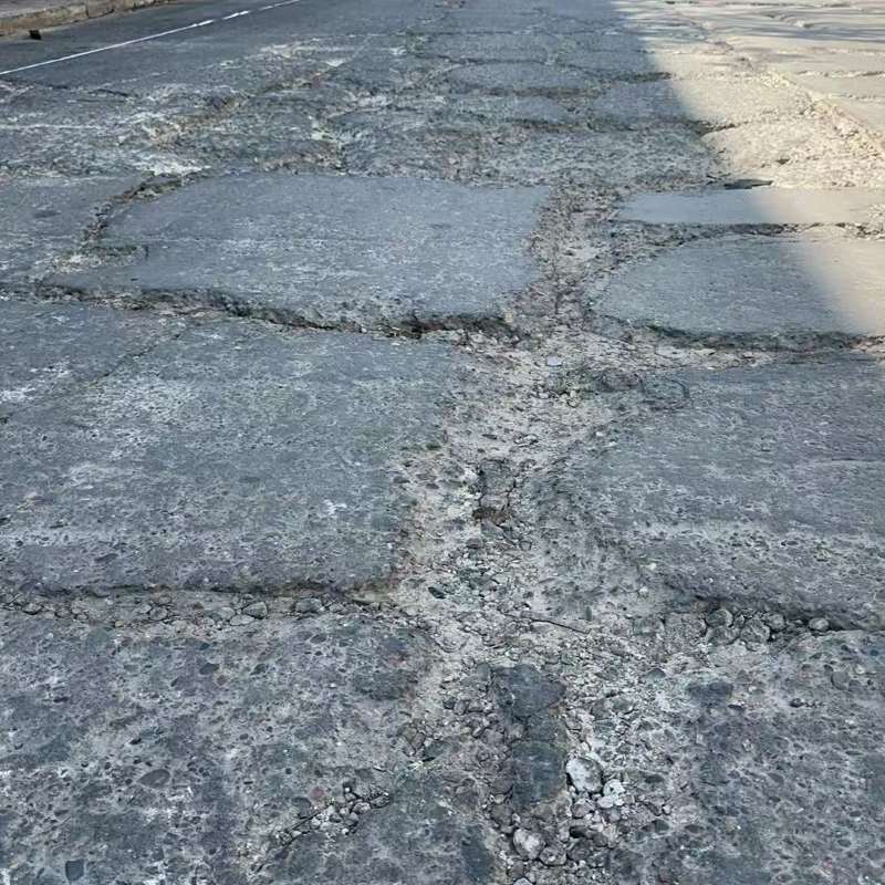 揭西路面起砂露石子修补料